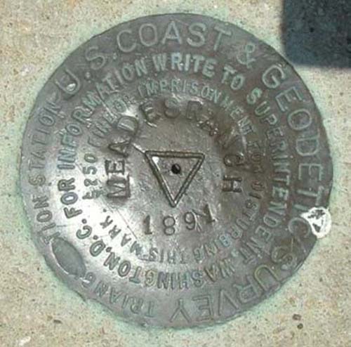 Close-up of the brass marker at the Initial Point of North American Datum of 1927 (NAD27)